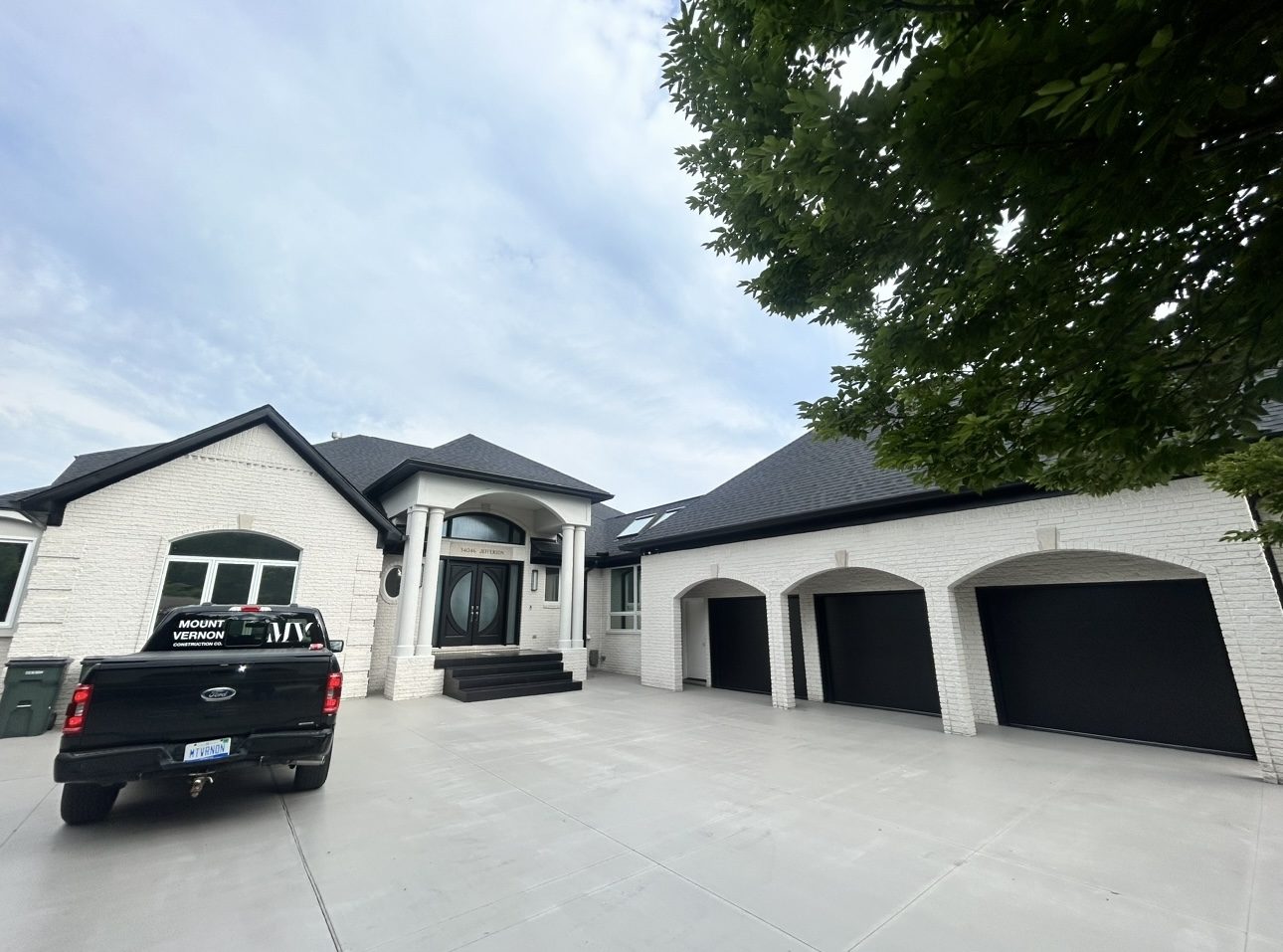 Completed exterior and drive of a renovated Southeastern Michigan home by Mount Vernon Construction