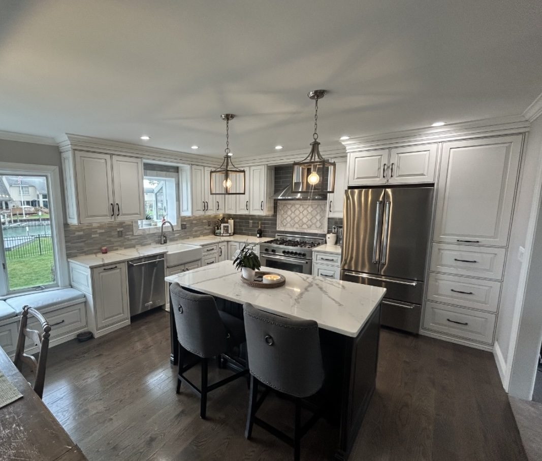 Custom kitchen remodel with marble island, custom cabinetry and pendant lighting, Oakland County Michigan